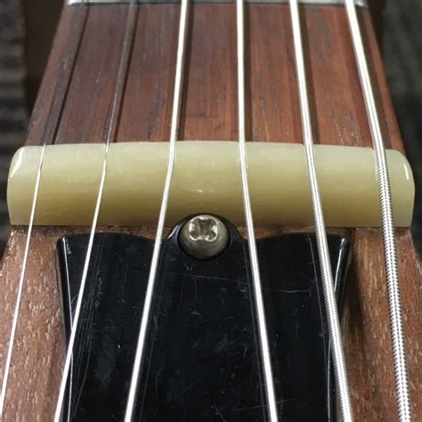 guitar nut repair|acoustic guitar nuts and saddles.